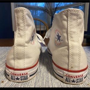 Excellent condition white Converse high tops. Women’s size 9.